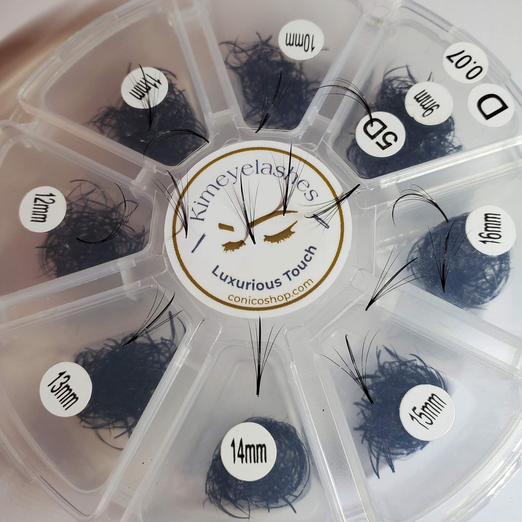 Eyelash extensions in black, various lengths, in clear plastic container, Kimeyelashes brand