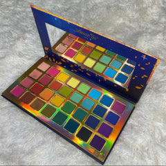 Remember Me eyeshadow palette featuring 12 vibrant matte and shimmer shades in a sleek black compact