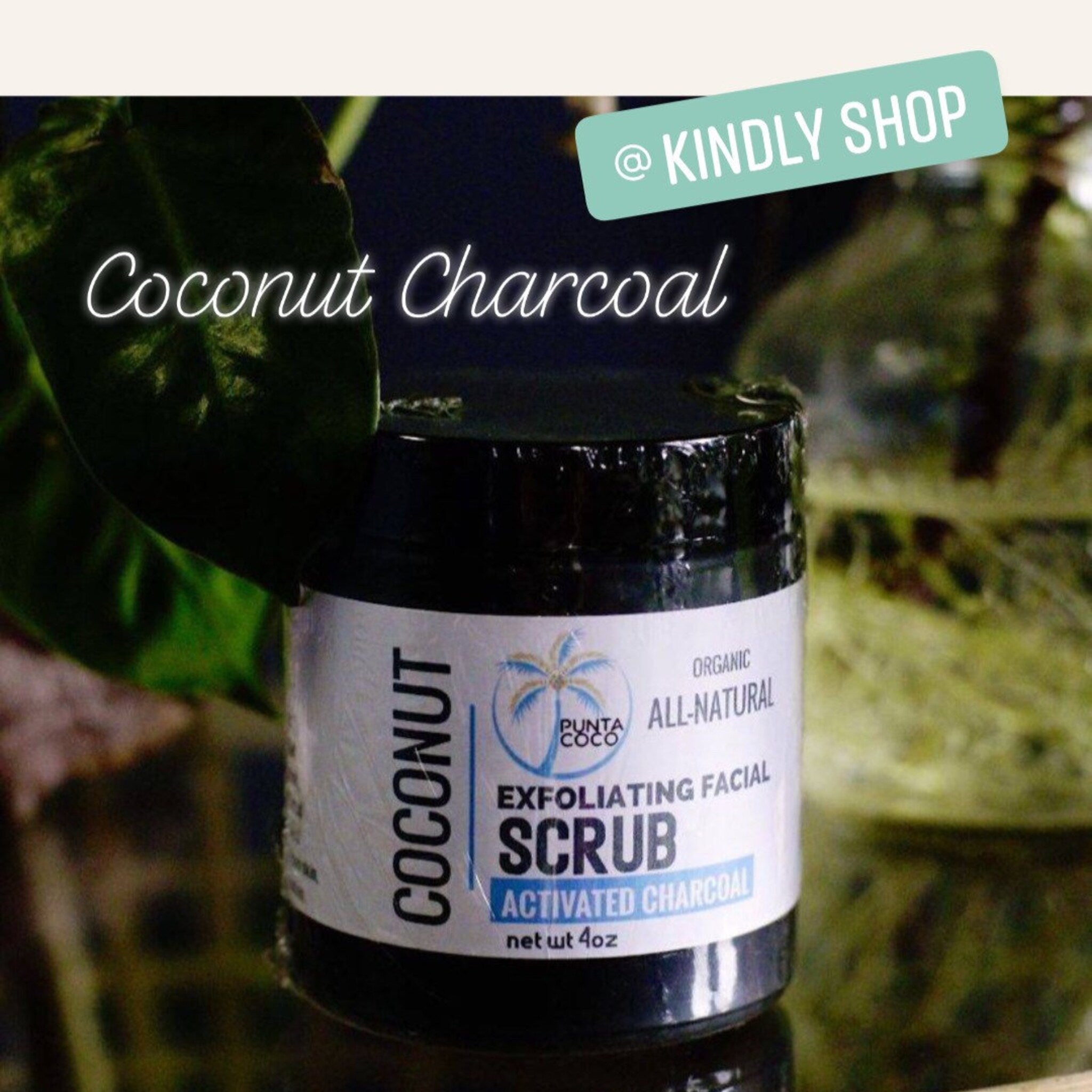 Coconut charcoal scrub jar with black lid, white label, and text "Punta Coco" and "SCRUB