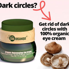 Elegant white tube of organic anti-wrinkle eye cream with gold accents, resting on marble surface