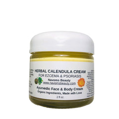 Herbal Calendula Cream jar with white lid, yellow cream, and Navoms Beauty label