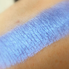 Close-up of vegan eyeshadow palette showing rich pigmented colors in matte and shimmer finishes