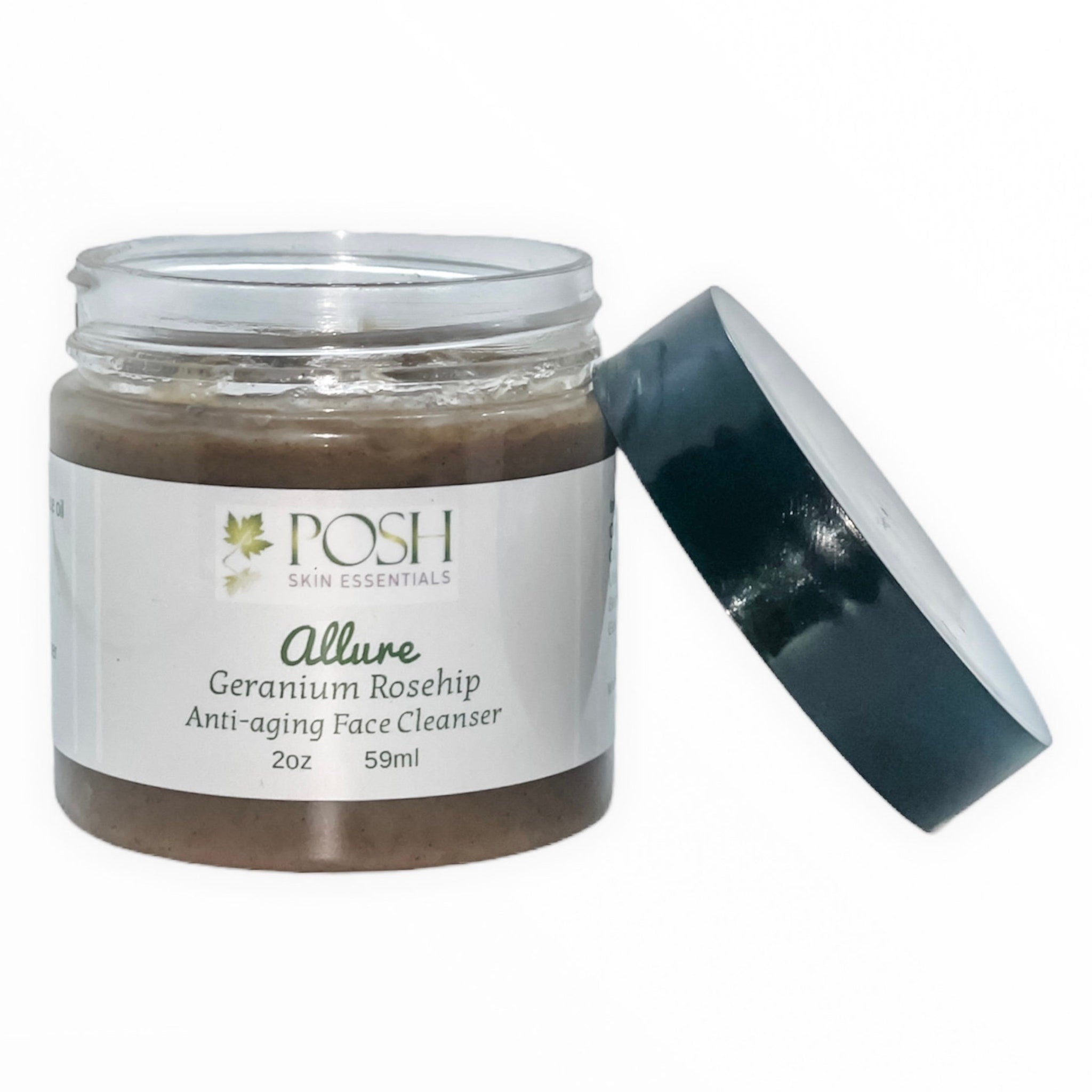 Face cleanser jar with glass, brown contents, and dark cap, POSH brand visible