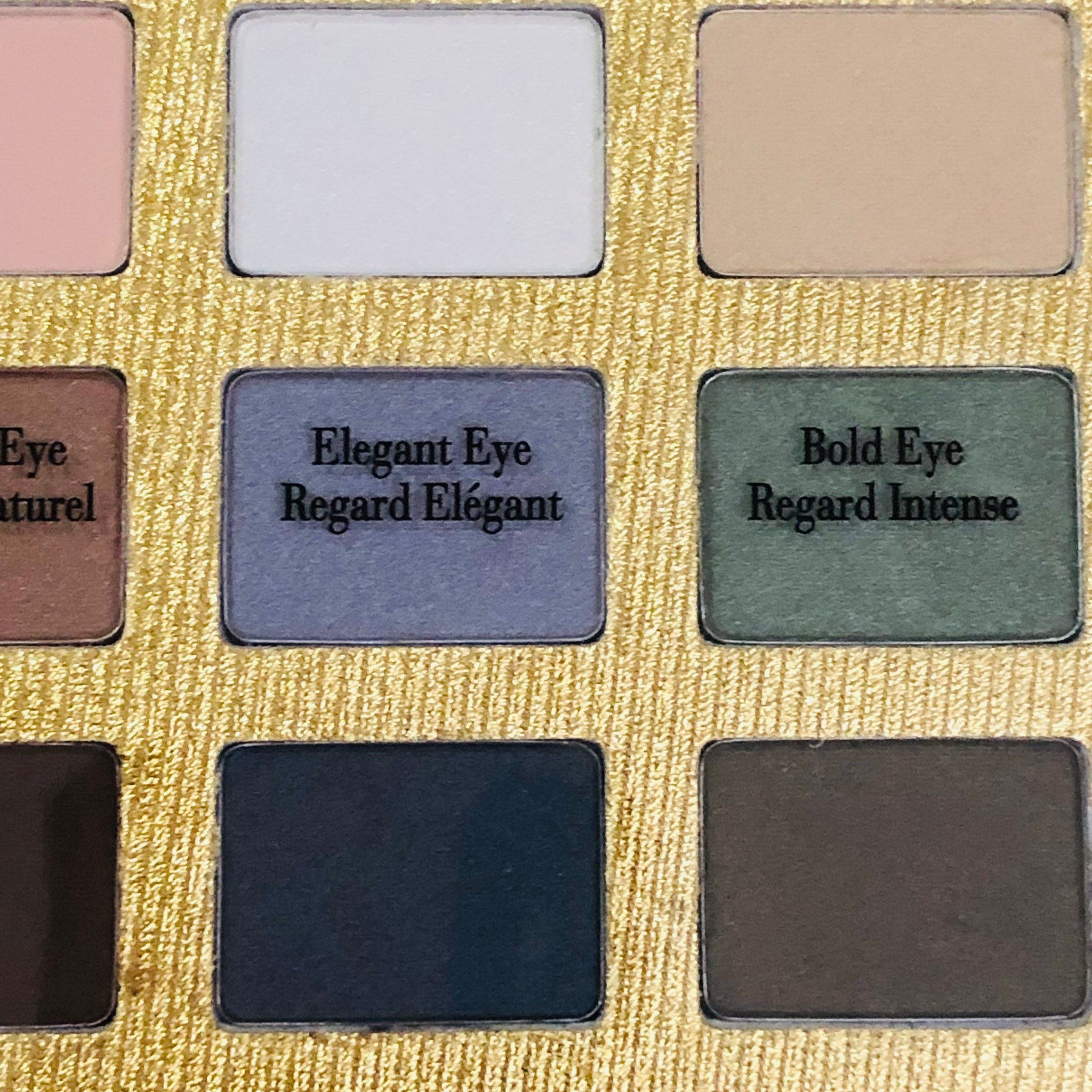 Elizabeth Arden Ombré 12 Eyeshadow Palette with free silver cosmetic bag on leopard-print case