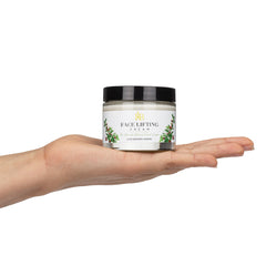 Face lifting cream jar with black lid, white label, and botanical accents held in hand