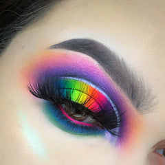Close-up of vibrant fluorescent neon orange mica pigment powder with shimmering particles for eye shadow makeup