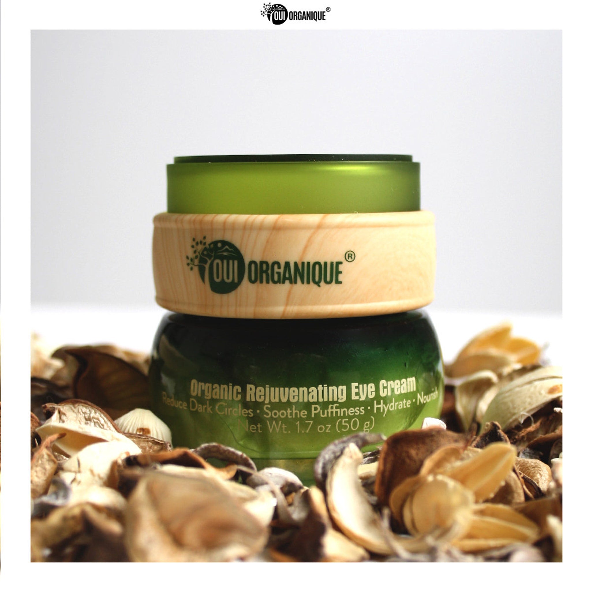 Eco-friendly amber glass jar of organic anti-wrinkle eye cream with gold lid and minimalist typography