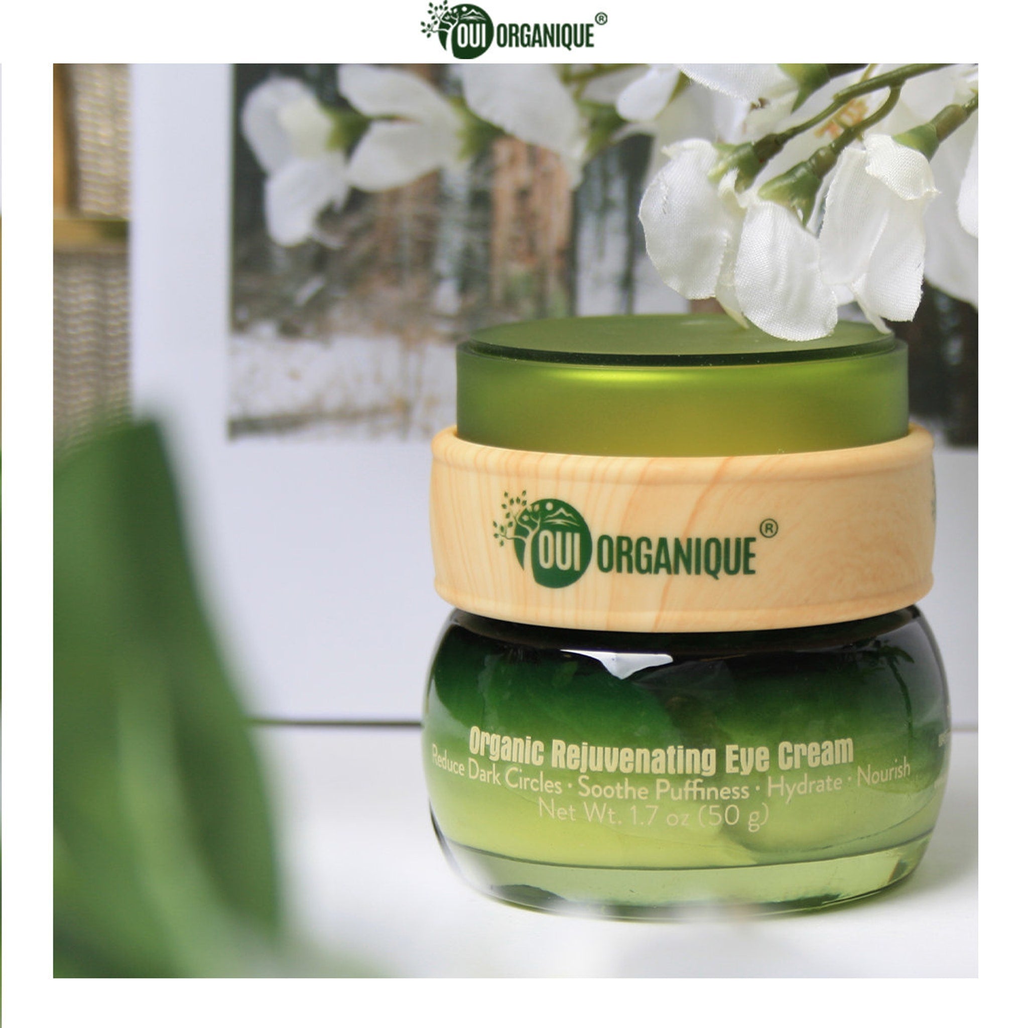 Close-up of fingertips applying organic anti-wrinkle eye cream to under-eye area with gentle patting motion