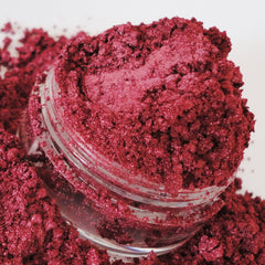 Vibrant red vegan eye shadow in a petite 5g sifter jar with black lid, showcasing intense mineral pigment.