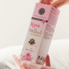 Rose water bottle, pink and white box, floral design, Skalli Essentials brand