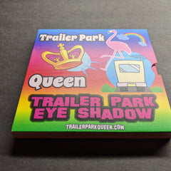 Trailer Park eyeshadow palette with colorful design, text, and illustration of a crown and flamingo