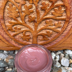 Close-up of shimmery Aurora Borealis Beauty Balm Eye Shadow palette showing iridescent teal and violet hues