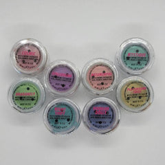 Close-up of multichrome eyeshadows showing vibrant color shifts in metallic finishes