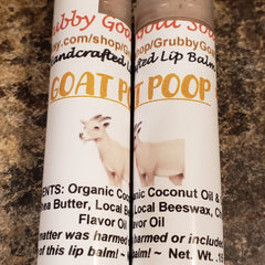 Lip balm tubes with white labels, goat illustration, and Grubby Goat text on brown background