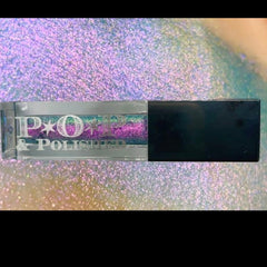 Vibrant purple multichrome liquid eyeshadow shifting to blue, green, and pink in sleek tube with doe-foot applicator