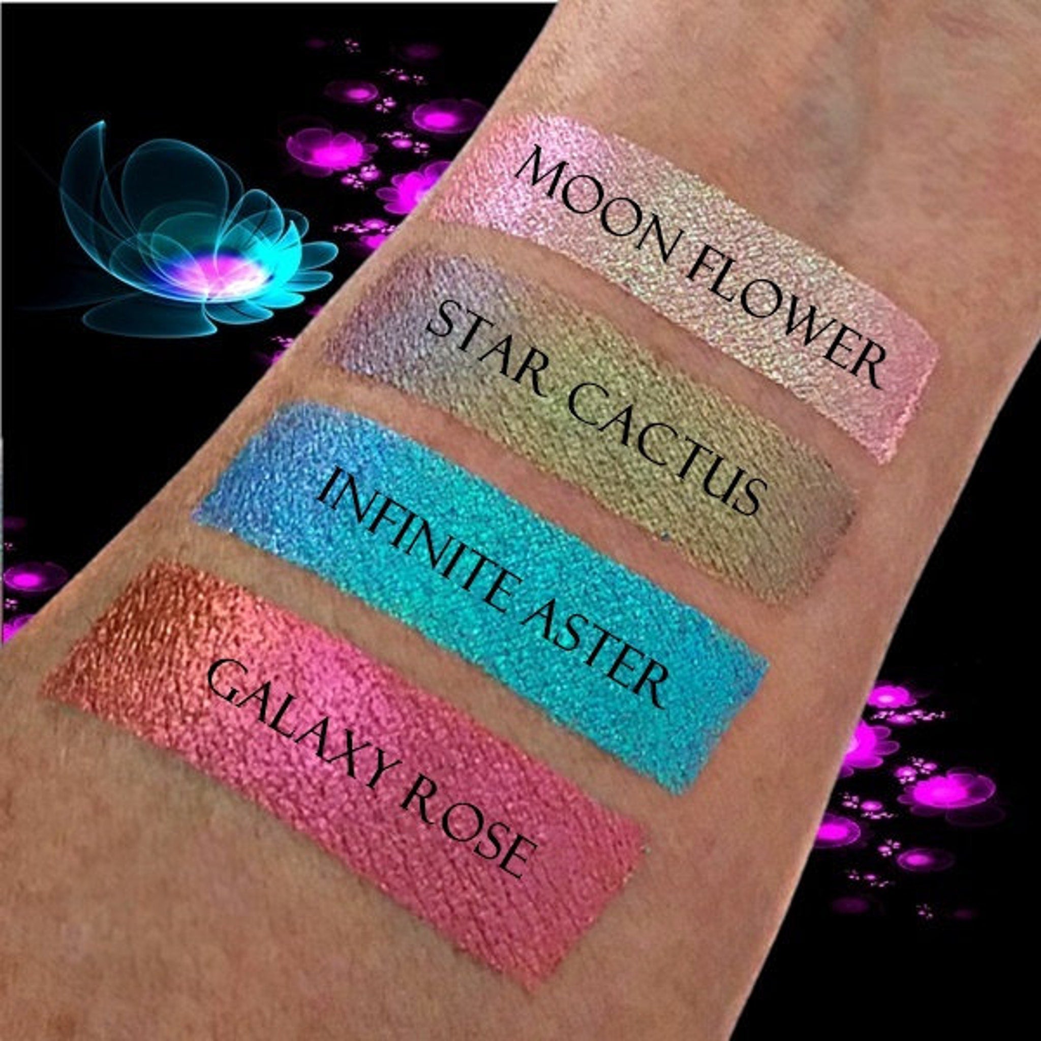 Side view of duochrome Infinite Aster eyeshadow pan showing color shift from lavender to deep violet