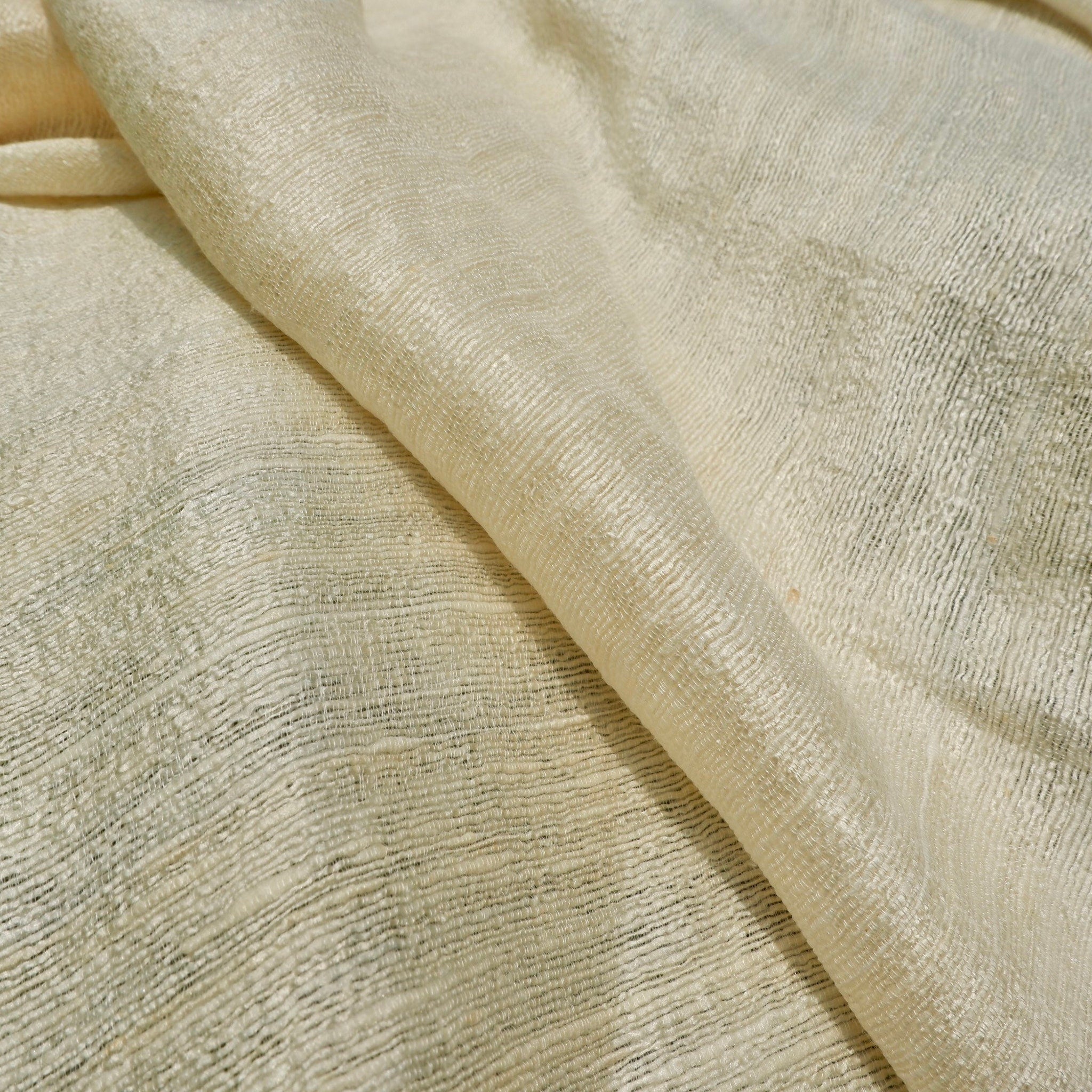 Cream-colored fabric with textured weave and draped style, HanhSilks product detail