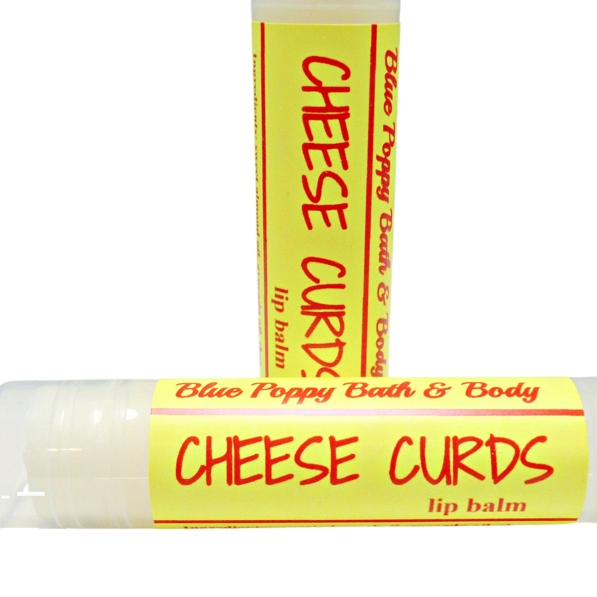 Lip balm with yellow label, red text, and Blue Poppy Bath & Body branding on white background