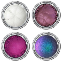 Masquerade Eye Shadow palette with six vibrant shades in matte and shimmer finishes, arranged in circular pans inside sleek black compact