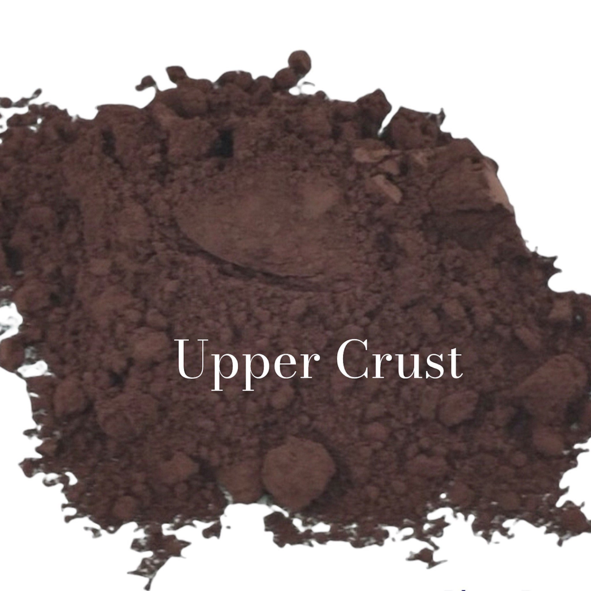 Square compact of matte brown mineral eyeshadow in taupe and light reddish brown shades, vegan organic makeup