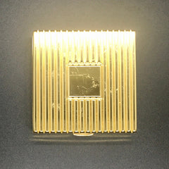 Face powder compact, gold-tone metal with ridged pattern and square center detail