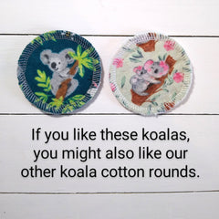 Koala cotton rounds with teal and floral patterns, white stitched edges, and koala illustrations