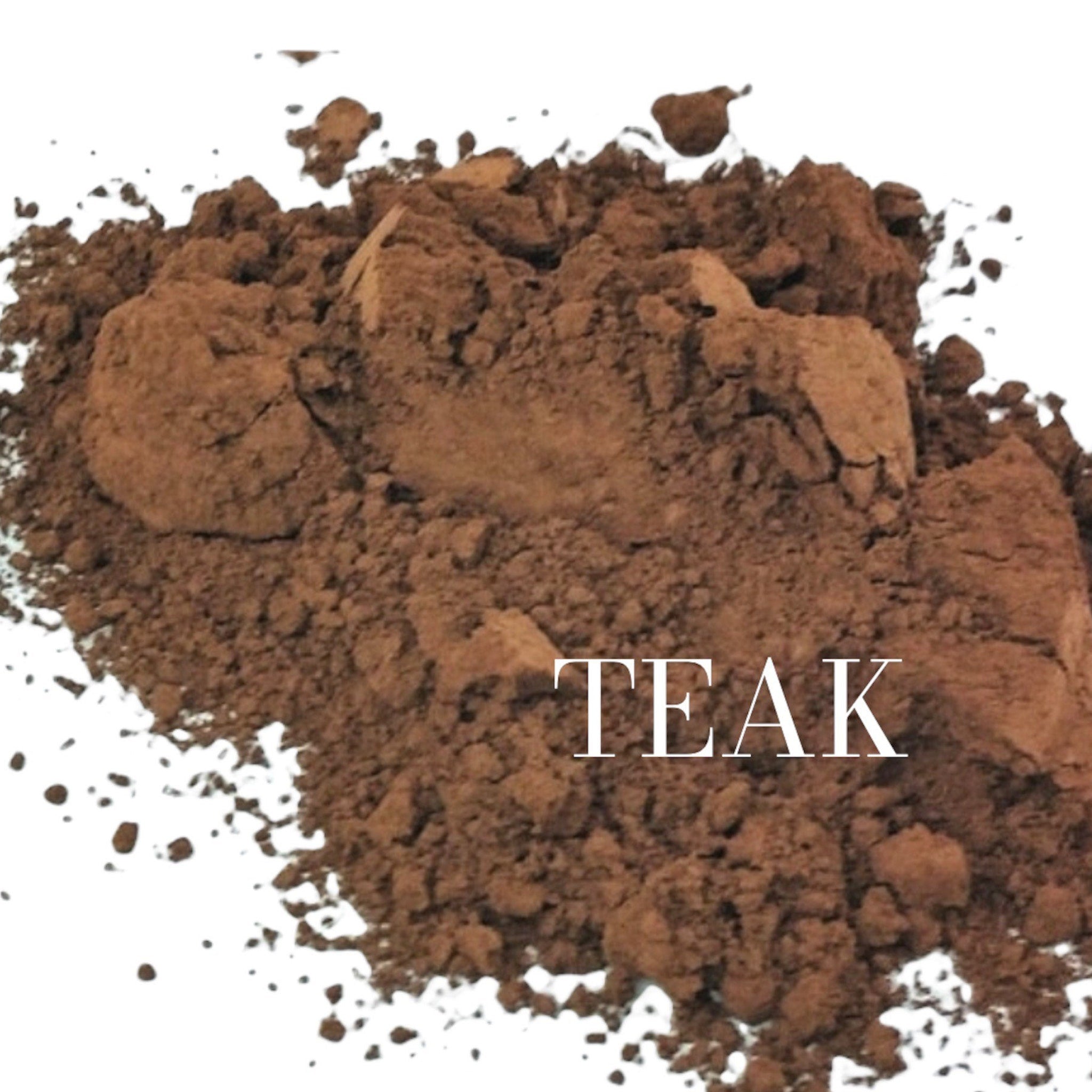 Close-up of matte taupe and light reddish brown mineral eyeshadow with smooth powder texture in compact