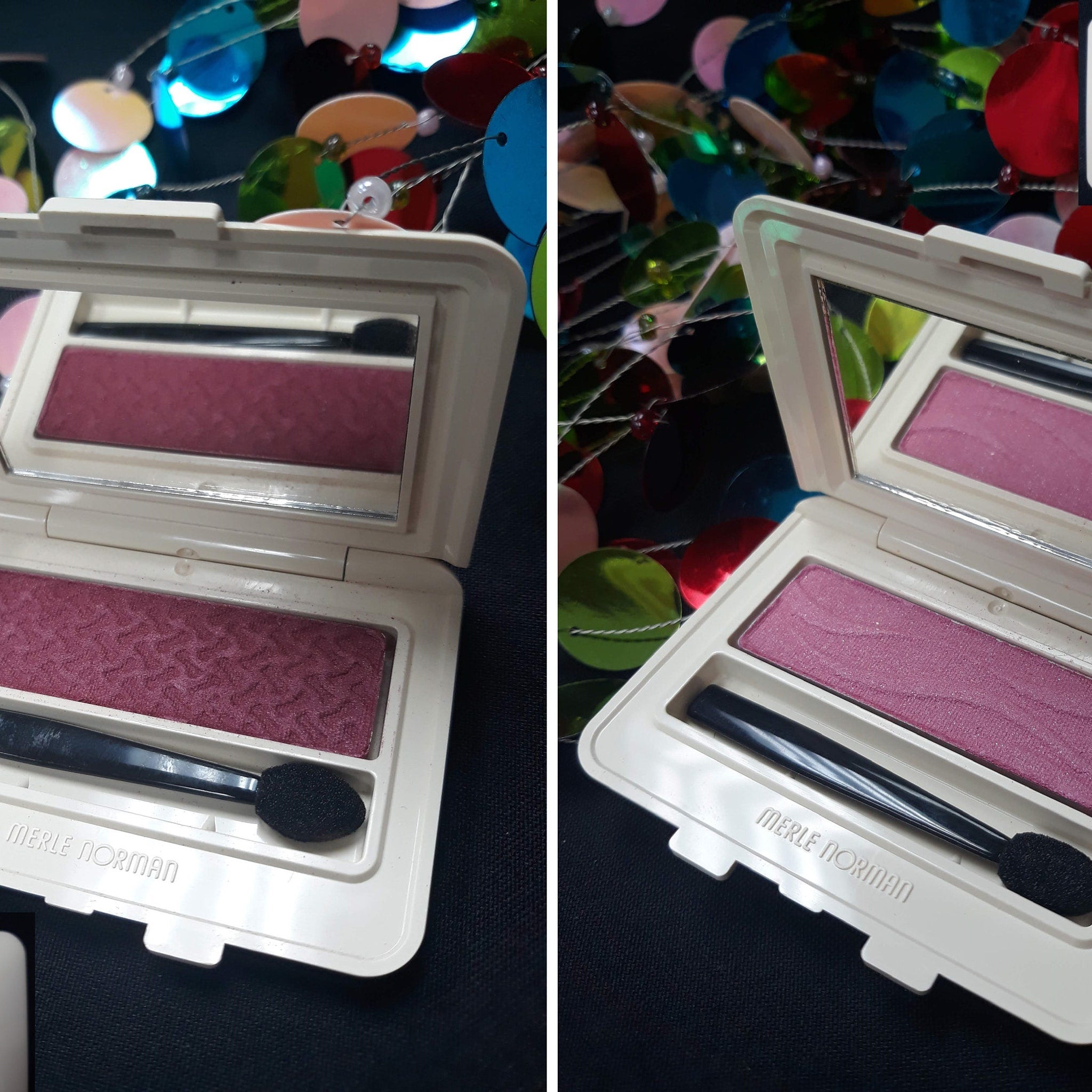 Side view of Merle Norman Luxiva eye shadow compacts showing stacked brown, pink, and purple shades in sleek black cases