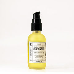 Facial cleanser bottle, yellow glass, black pump top, GingerChi label