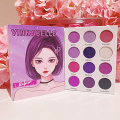 Kawaii Gothic purple eyeshadow palette with Saturn-inspired shades in sleek black compact featuring celestial design