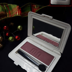 Close-up of Merle Norman Luxiva single eye shadow compact in shimmering pink with smooth satin finish