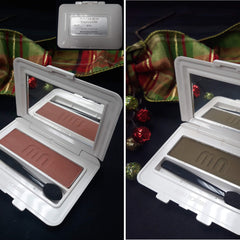 Side view of Merle Norman Luxiva single eye shadow compact showcasing rich brown, pink, and purple shades in square pan