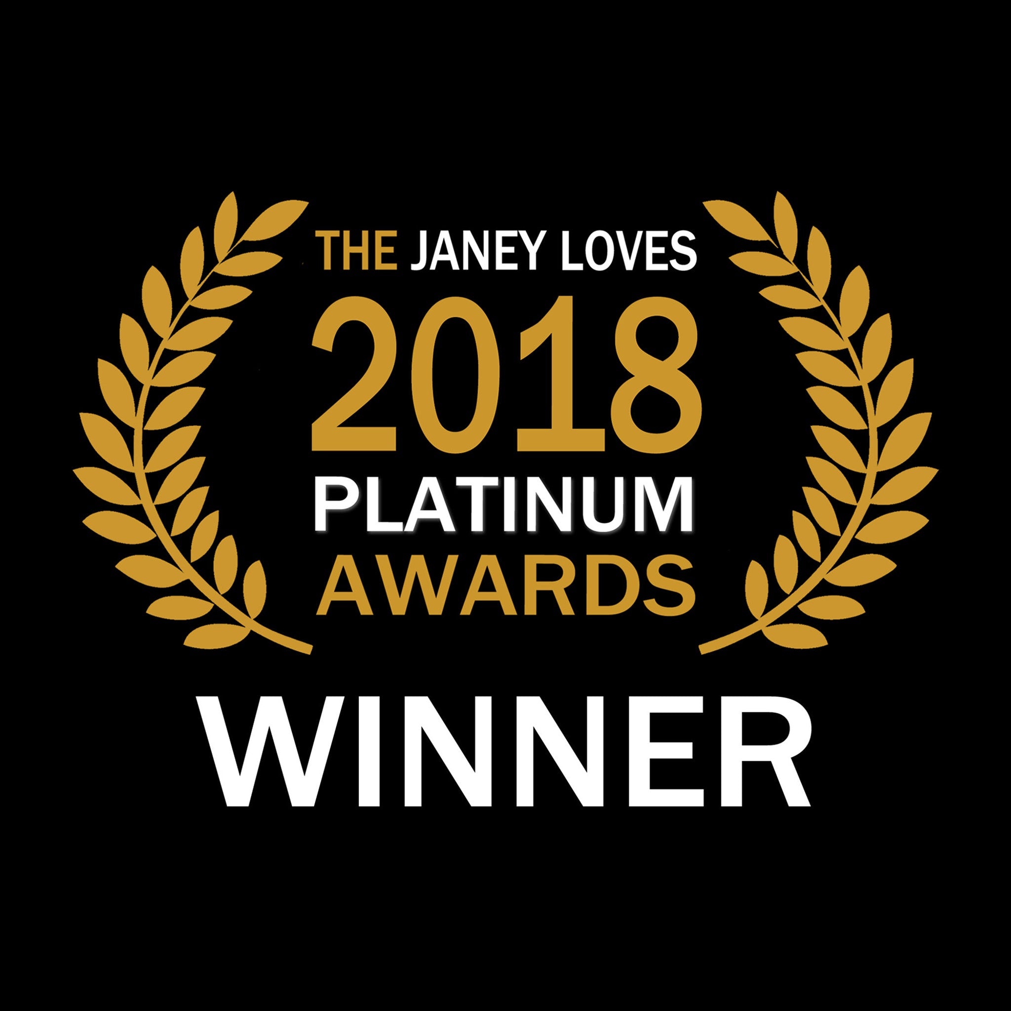 Award logo with gold laurel wreath, white text on black background, "The Janey Loves 2018 Platinum Awards Winner