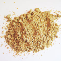 Close-up of matte Cornsilk mineral eye shadow with soft beige tone in compact case