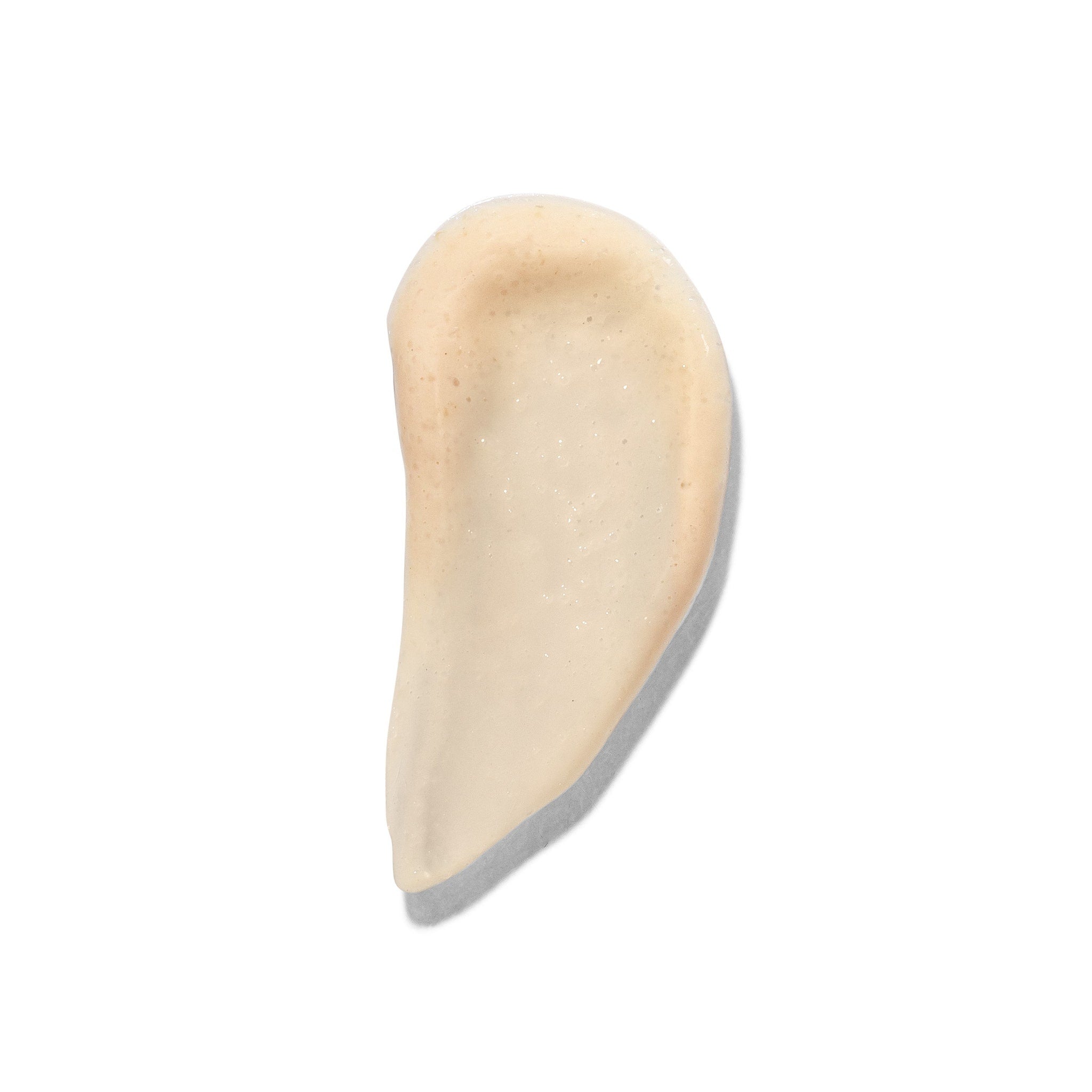 Cream swatch with light beige color and smooth texture on white background
