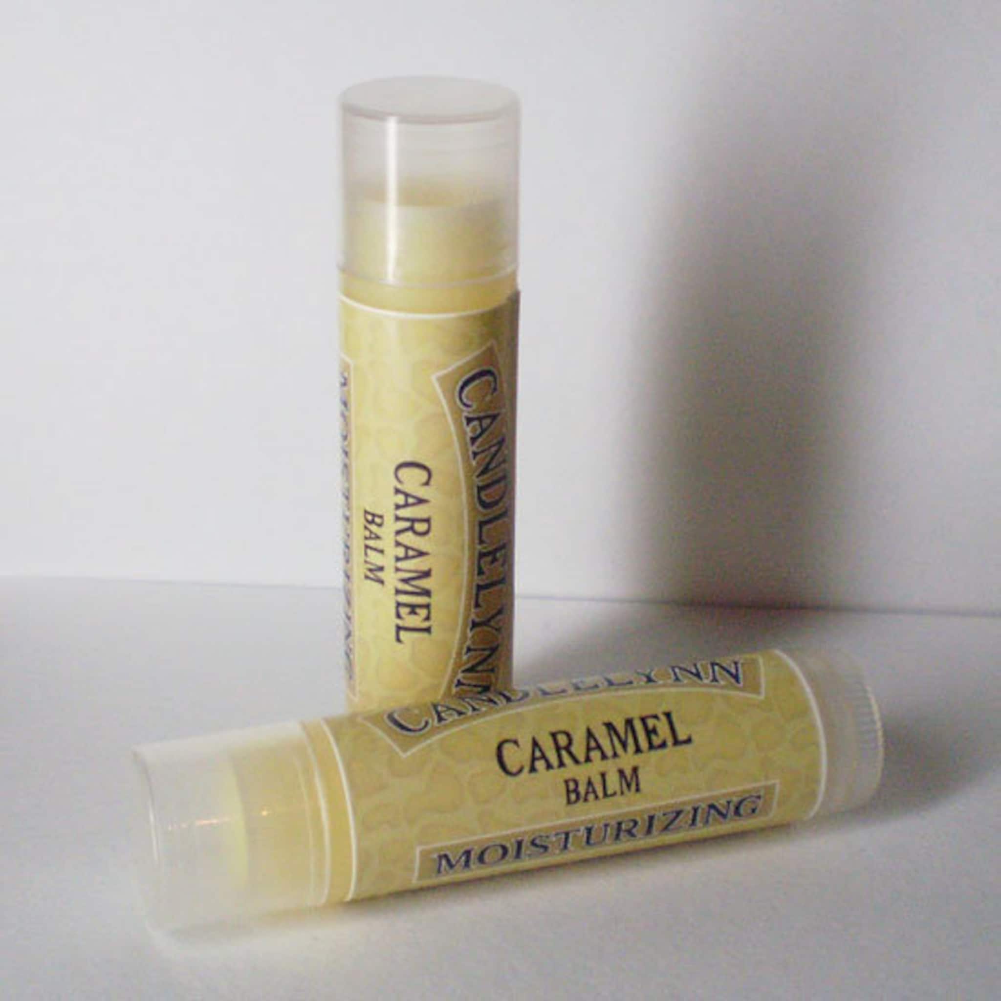 Lip balm tubes with yellow label and clear cap, Candle Lynn Caramel Balm shown