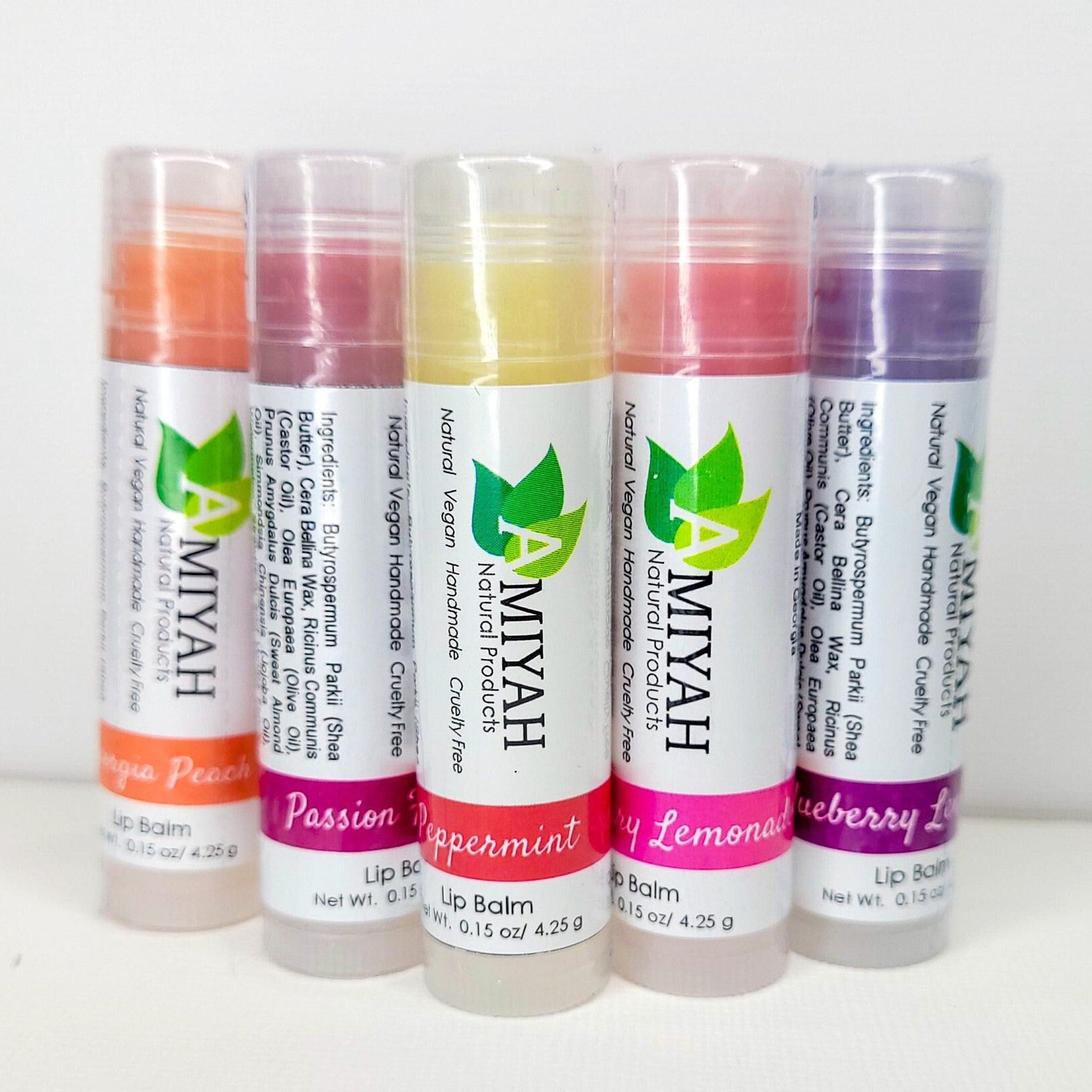 Lip balms with colorful tubes and Amiyah Natural Products branding, in a bundle