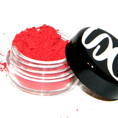 Side view of Queen of Hearts matte red eye shadow pan showing rich pigment texture in compact case