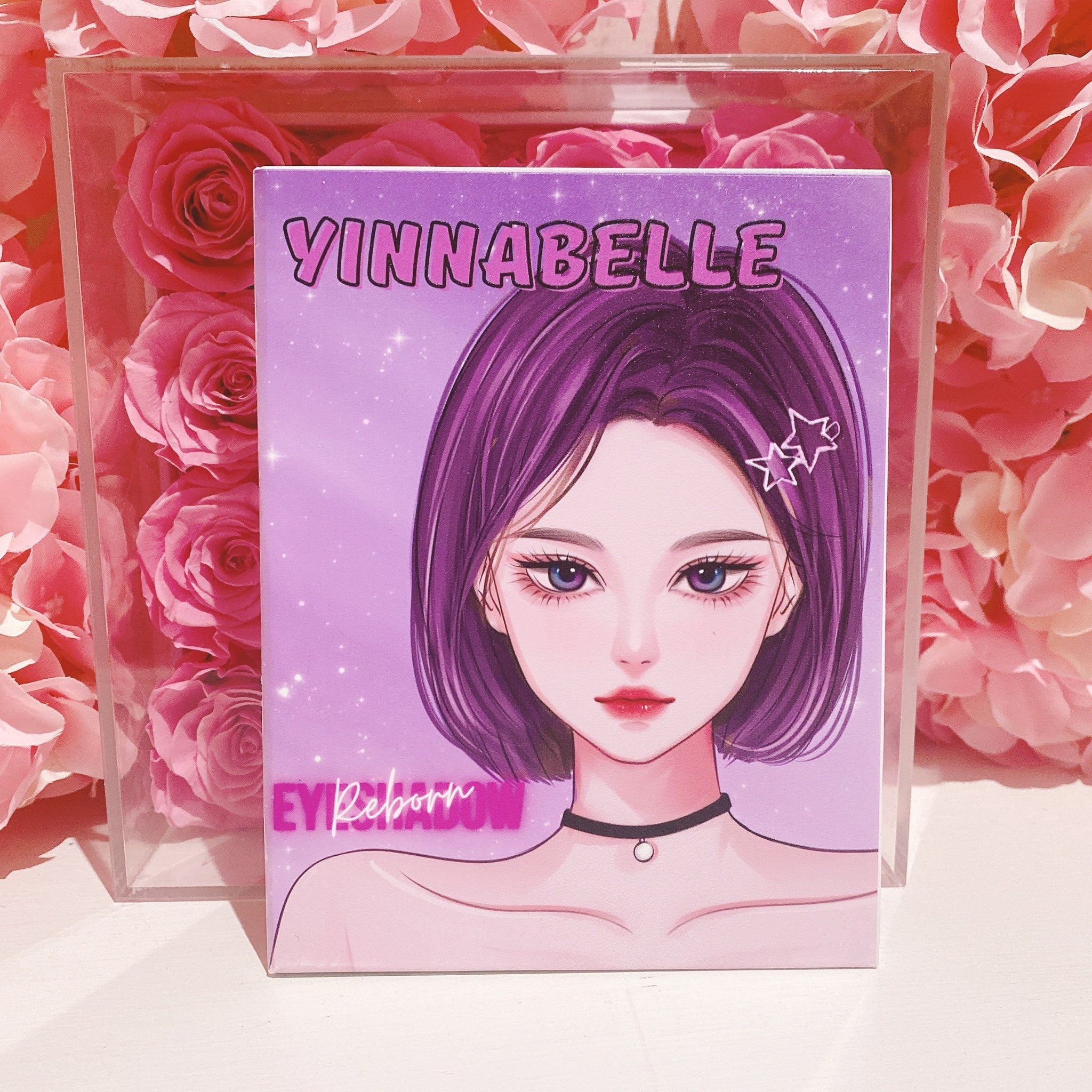 Side view of Kawaii Gothic purple eyeshadow palette showing gradient shades from lavender to deep plum