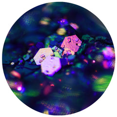 Close-up of chameleon glitter eye shadow palette showing vibrant shifting colors and sparkling finish