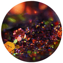 Side view of chameleon glitter eye shadow bundle showing multi-color shift in compact palette
