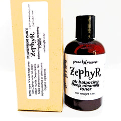 Toner bottle with black cap, brown liquid, and white label with Zephyr text