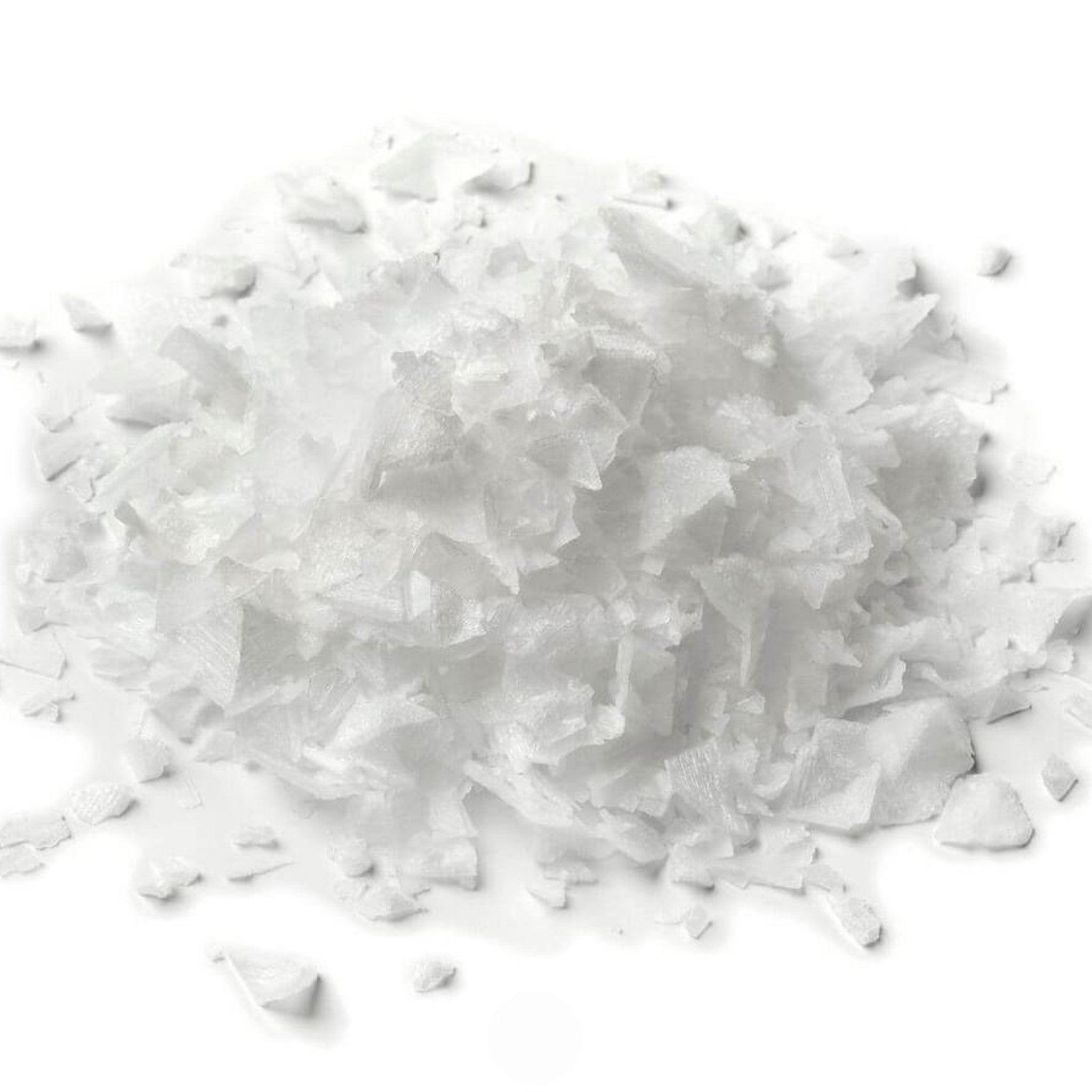 Flaked salt crystals, white, irregular shape, pile on white background