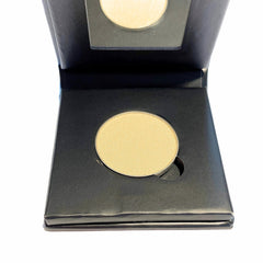 Square paperboard compact of lemon yellow mineral eye shadow with matte finish