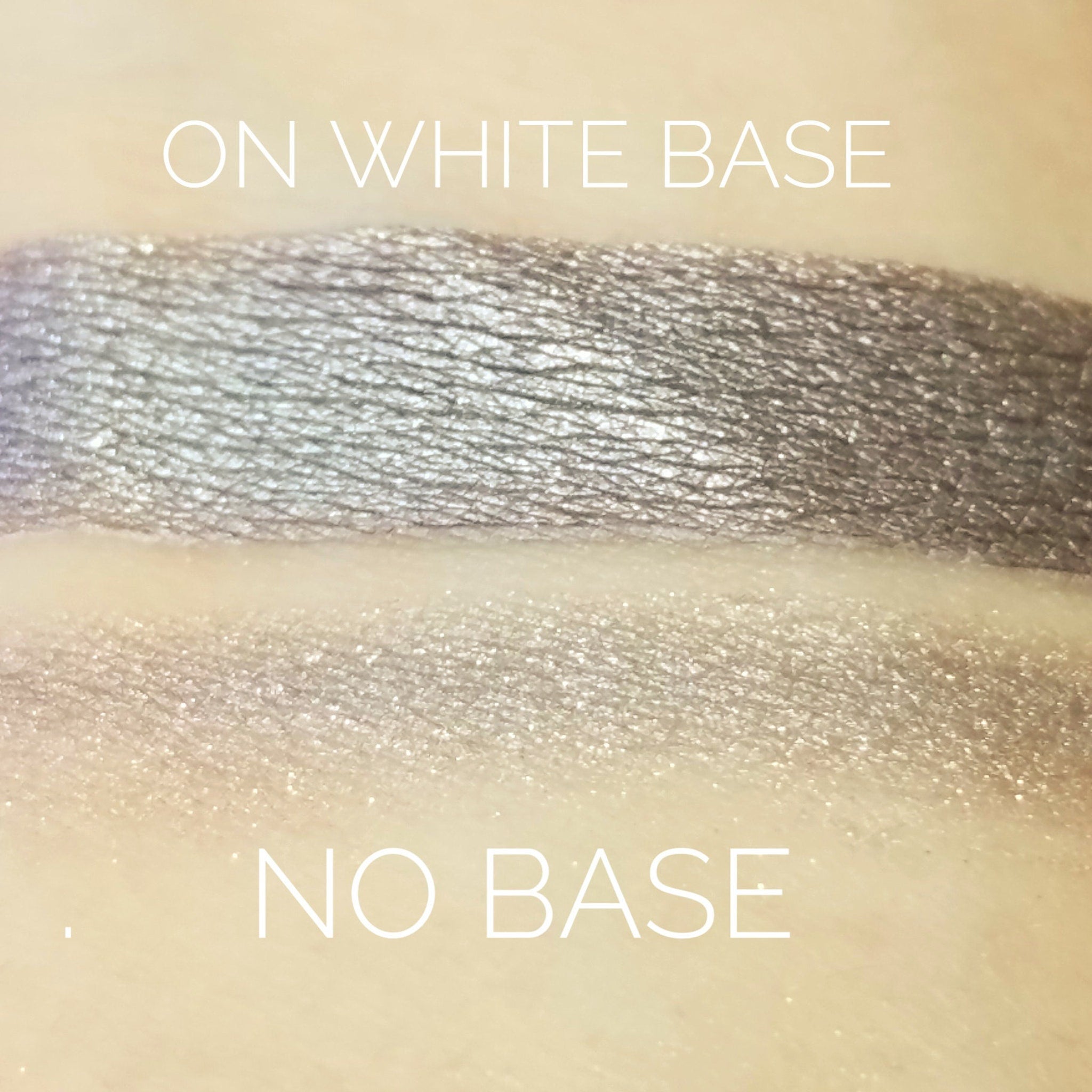 Close-up of Tundra Eye Shadow pan showing frosty silver-blue powder with shimmer particles