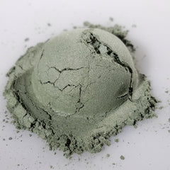 Close-up of Camouflage Eye Shadow palette showing matte neutral shades in a sleek black compact
