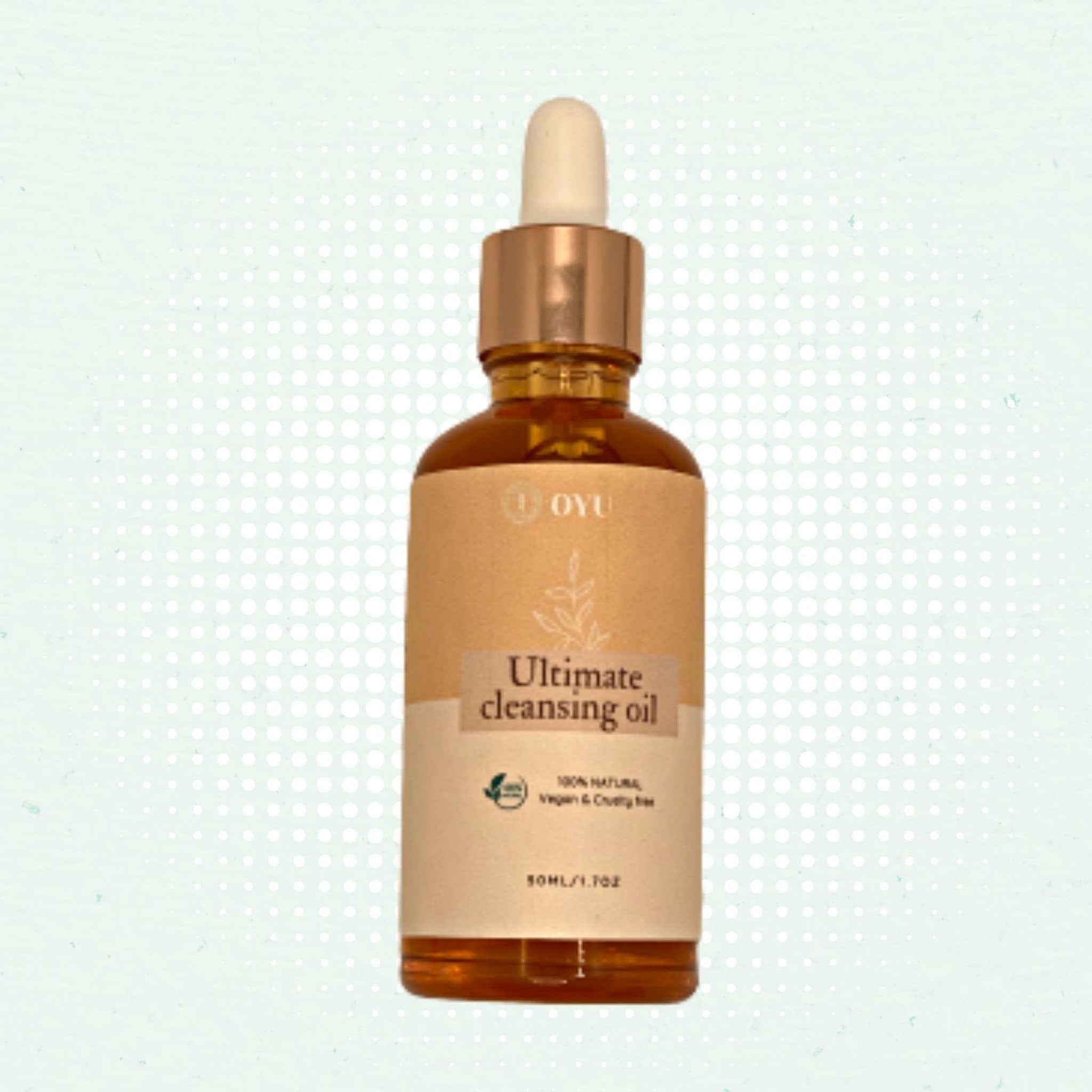 Cleansing oil bottle with gold cap, amber liquid, and "OYU" label for skincare