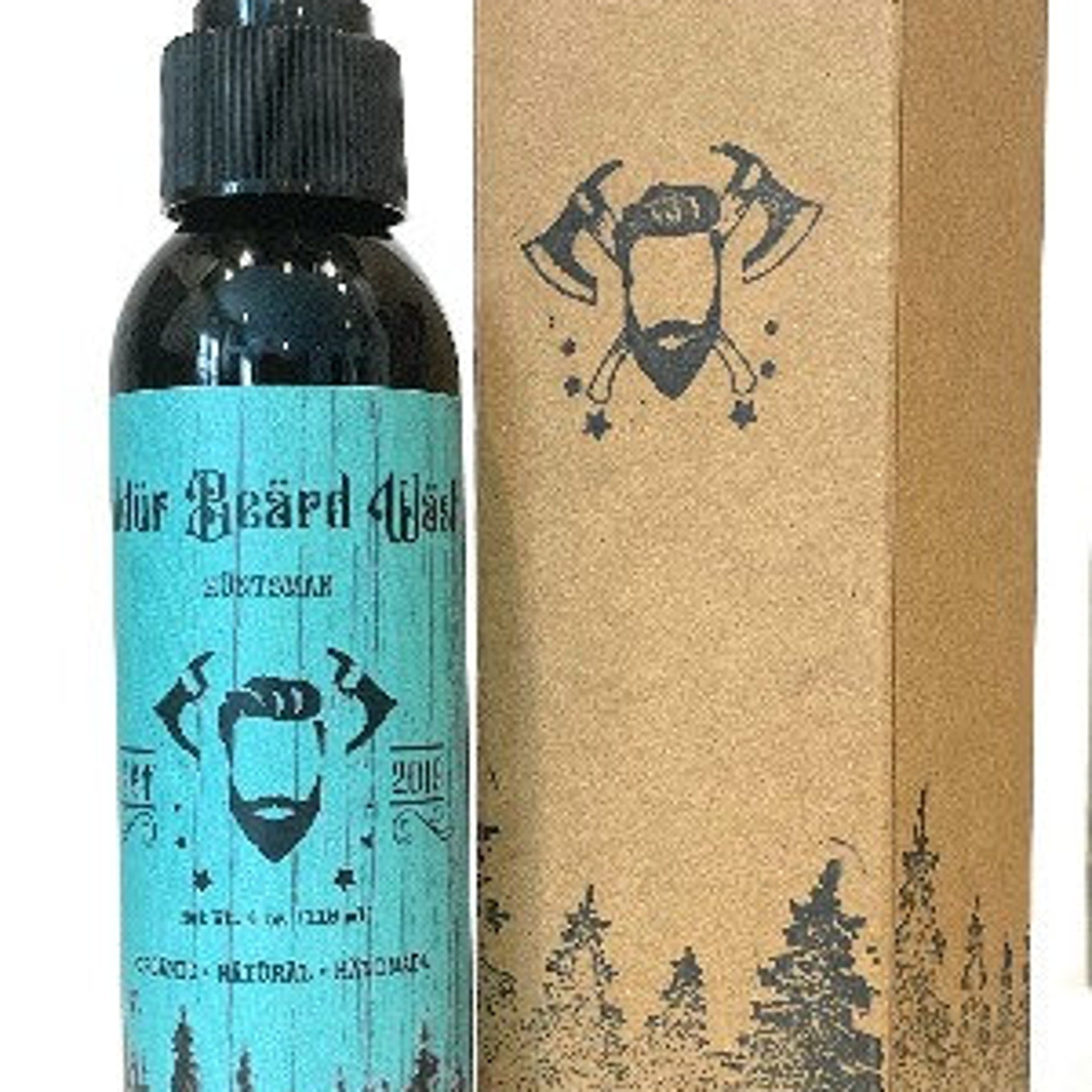 Facial Cleanser bottle with black cap, teal label, and brown box with Baldur Beard logo
