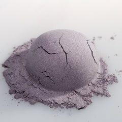Ominous Eye Shadow palette featuring deep matte black and shimmering charcoal shades in sleek rectangular compact