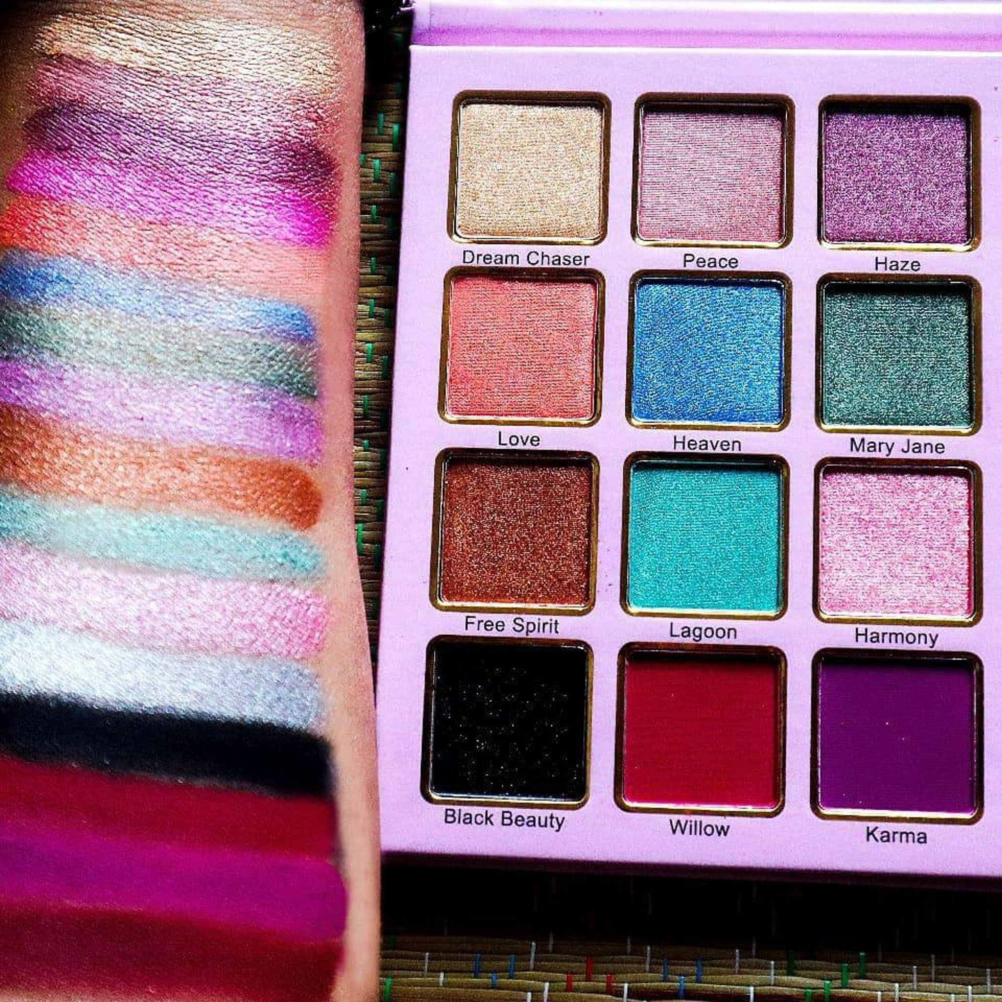 Side view of Bohemian Eyeshadow Palette showing twelve vibrant matte and shimmer shades in rectangular pans